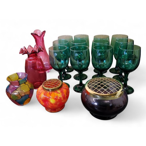 190 - A set of twelve emerald glass wine glasses, bucket shaped bowls, 18cm high;  a cranberry glass vase;... 