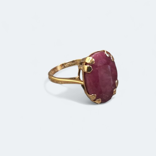 197 - A 9ct gold & ruby solitaire ring, claw set oval ruby, approx 18 x 13mm, size N1/2, ruby  6.85g