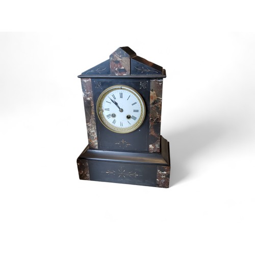 354 - A late 19th century slate and marble mantel clock, Roman numerals, twin winding holes, striking on a... 