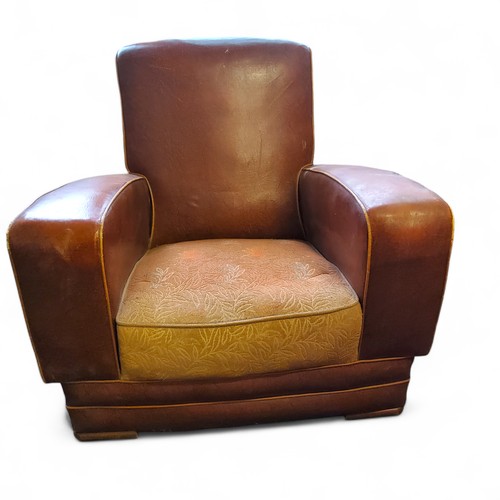 453 - A pair of Art Deco leatherette club chairs