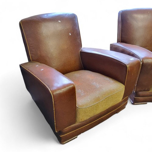 453 - A pair of Art Deco leatherette club chairs