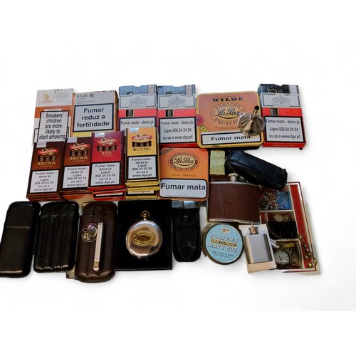 306 - A Zippo Venetian slim brass lighter; a leather three cigar holder; others; various unopened individu... 