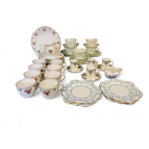 335 - A Royal Doulton part tea service, comprising eight cups, eight plates, two bread and butter plates, ... 