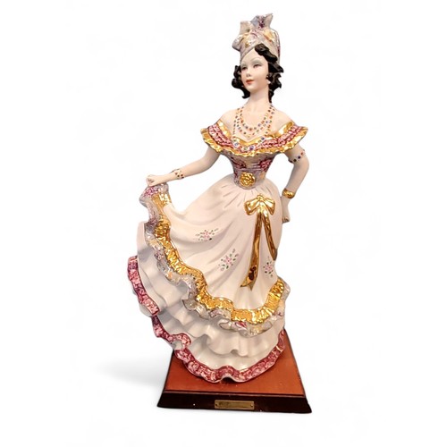 351 - A Capo-di-Monte figure, modelled  by Vittorio Sabadin, Gypsy Dancer, 49cm high, wooden plinth