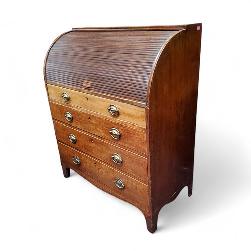 55 - A George III mahogany roll top bureau, tambour front revealing pigeon holes and drawer lined interio... 