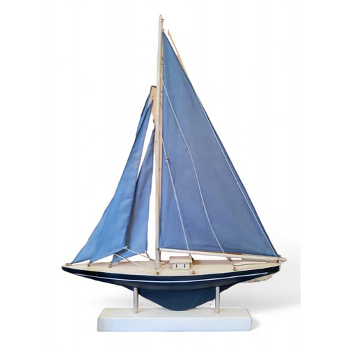 70 - A pond yacht, blue sails, 78cm high