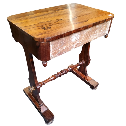 81 - A Victorian rosewood hall table, well figured, one long drawer to frieze, turned handles, H-stretche... 