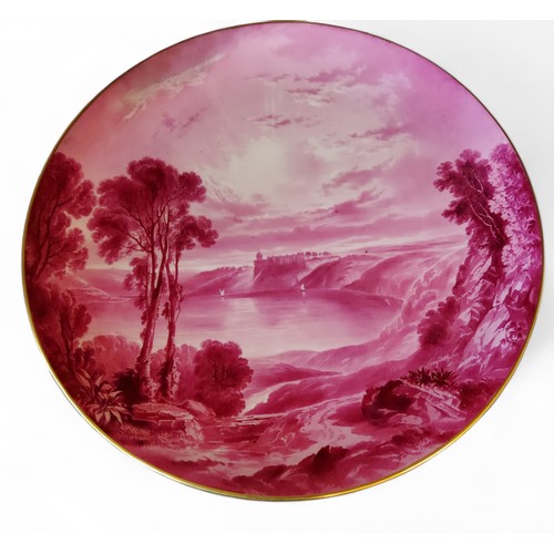 338 - A Copeland circular charger, painted by W Birbeck, in puce, with Lake Albano, gilt line border, 31.5... 