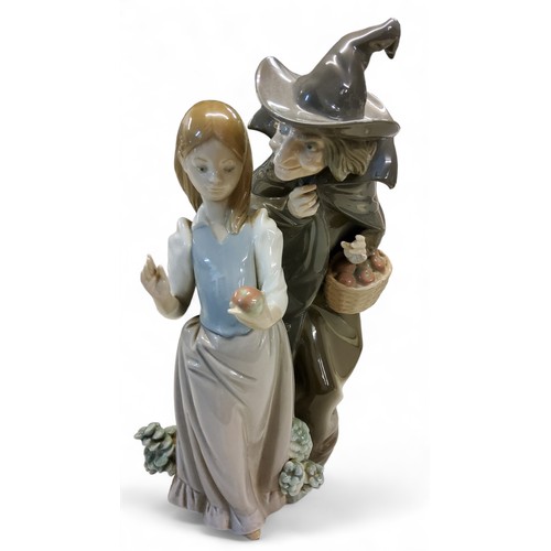 372 - A Lladro figure group, Snow White and the Witch, 27cm high, printed mark;  a Lladro model,... 