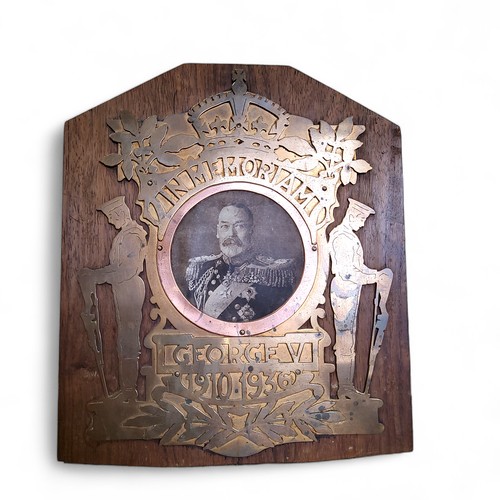 166 - A George V brass memorial plaque, inscribed In Memoriam George V 1910 - 1936, pierced and cut, with ... 