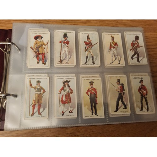 586 - Cigarette Cards - approximately 150 cards;  Players Regimental Uniforms, R.A.F Badges, Hignett ... 