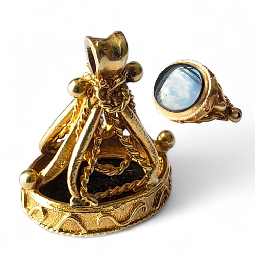 257 - A 9ct gold seal fob, set with an oval onyx stone