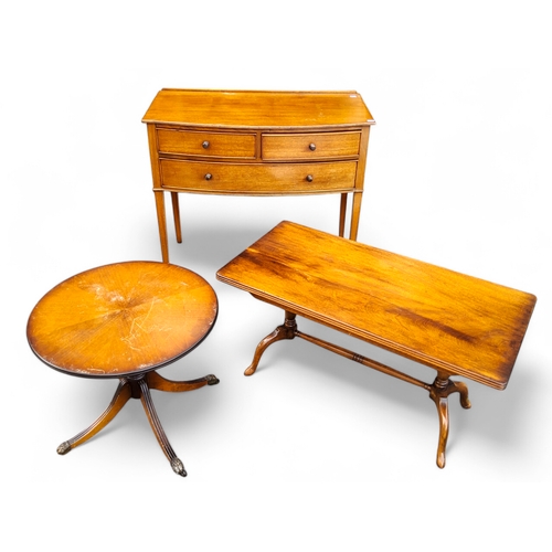 644 - A reproduction hall table; rounded rectangular coffee table;  a circular occasional table; ... 