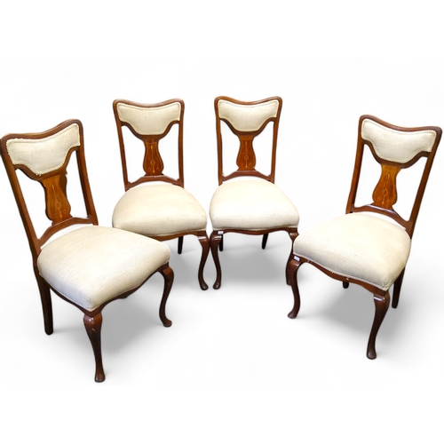 634 - A set of four Edwardian Sheraton Revival dining chairs, sinuous satinwood and boxwood inlay to splat... 