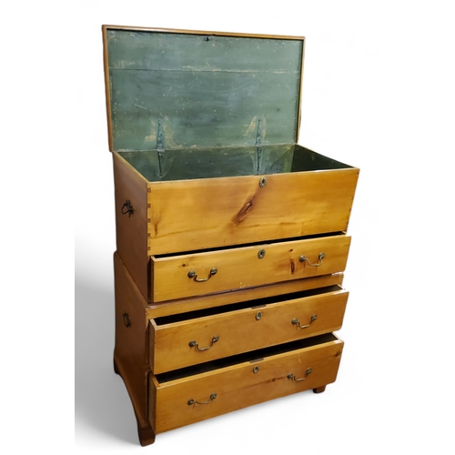 461 - An early 20th century farmhouse pine chest on stand,  the top section as a mule chest, the base... 