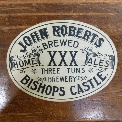 505 - An early 20th century point of sale cabinet, 'John Roberts home brewed XXX ales, Three Tuns Brewery,... 