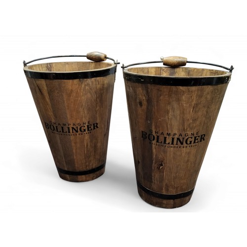 569 - A pair of tapering coopered wood buckets, inscribed Champagne Bollinger, Maison Fondee en 1829, swin... 