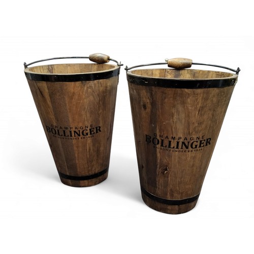 569 - A pair of tapering coopered wood buckets, inscribed Champagne Bollinger, Maison Fondee en 1829, swin... 