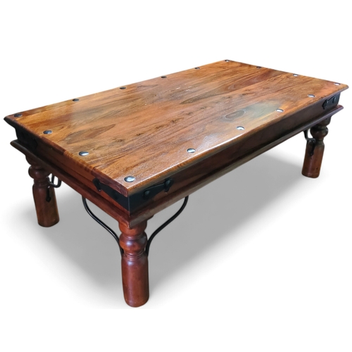 370 - A contemporary metal bound Indonesian hardwood coffee table, 40cm x 111cm x 61cm