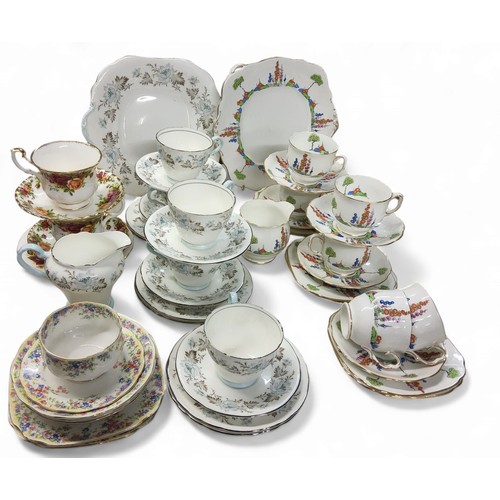 107 - A Royal Albert Happyland tea service, for six, printed marks;   two Royal Albert Old Count... 