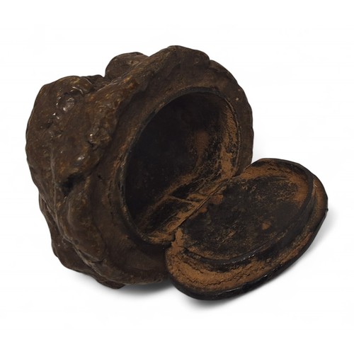 219 - A novelty Victorian papier mache snuff box in the form of a dog poo c.1880