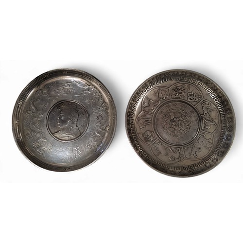 238 - A pair of Chinese plated pin dishes, inset with coins, 9cm diam