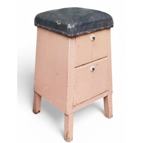 403 - An early 20th century painted pine seamstress stool, stuffed over seat above one drawer and hinged c... 