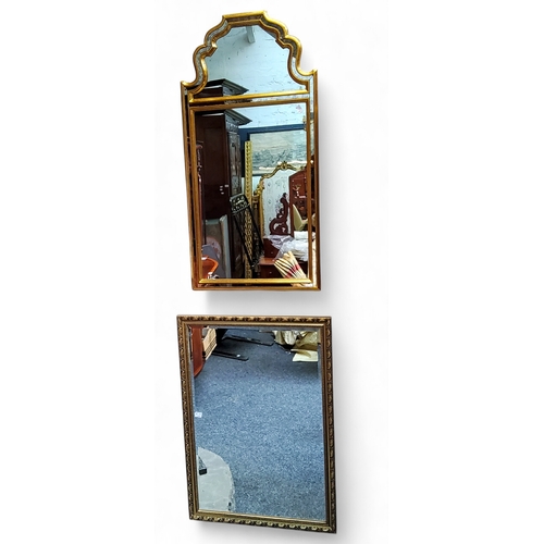 669 - Two modern gilded mirrors including an arched 'foxed' looking glass bordered example, another rectan... 