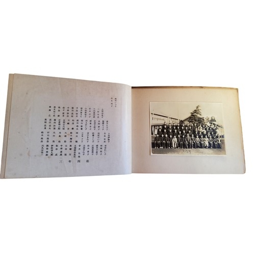 463 - An interesting mid 20th century Japanese photograph album, black and white images, 28cm x 25cm