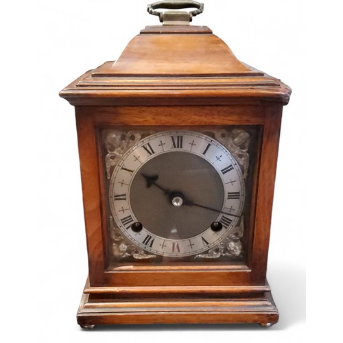 427 - An 18th century style walnut bracket clock, the 10cm dial with silvered chapter ring, Roman numerals... 