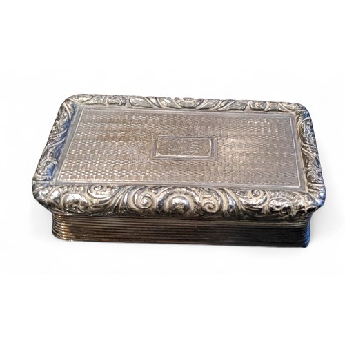 16 - A George III silver rectangular snuff box, the cover with central cartouche, engraved in lines, foli... 