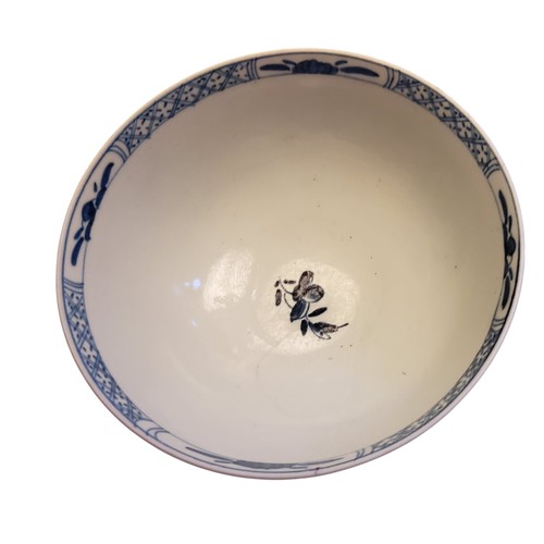 141 - A Worcester Warbler pattern slop bowl,  painted in underglaze blue, the verso with holed rock and zi... 