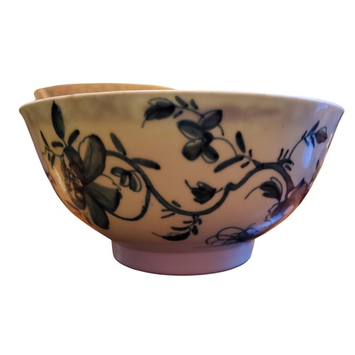 141 - A Worcester Warbler pattern slop bowl,  painted in underglaze blue, the verso with holed rock and zi... 