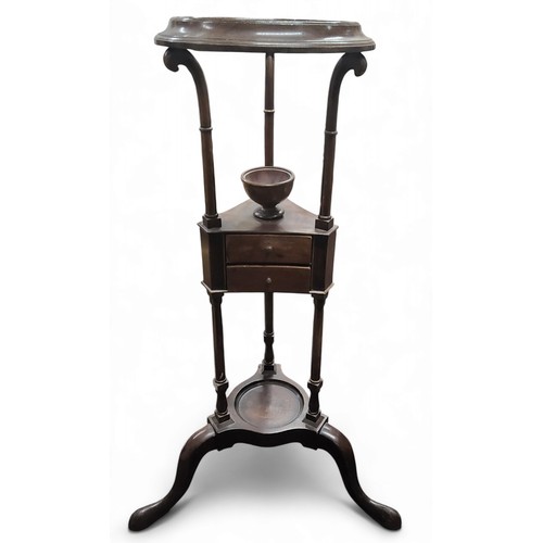 666 - A George III mahogany tripod wig stand or washstand, 92cm high, 30.5cm diameter, c.1800