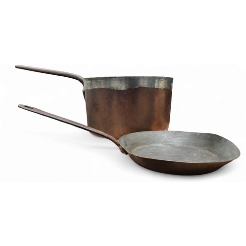 292 - A 19th century copper saucepan, inscribed DUNKELD, steel handle, 26.5cm diam, 51cm over handle, c.18... 