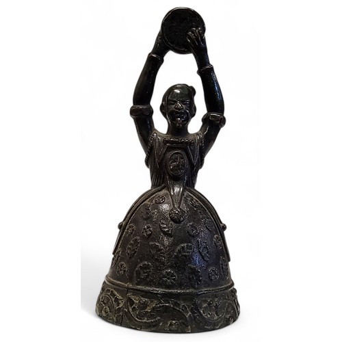 353 - A novelty Turkish bronze table bell surmounted with Whirling Dervish, 13cm high