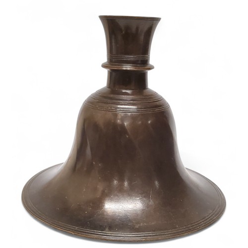 274 - A '15th century' Iranian bronze Timurid bell shaped candlestick, 15cm x 15cm x 15cm