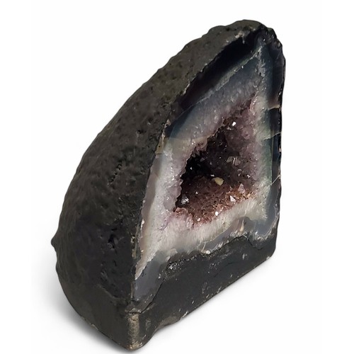 692 - Geology - an amethyst geode cross section, 24cm x 19cm