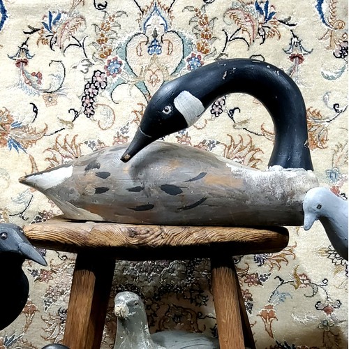 335 - A Canada goose decoy, naturalisticaly carved and painted in the manner of Guy Taplin