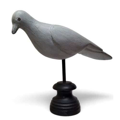 676 - A Guy Taplin type woodpigeon decoy on stand, 23.5cm x 34cm