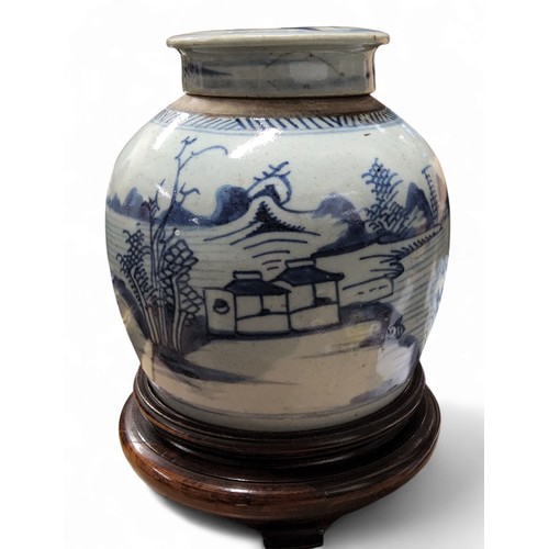 239 - A Chinese ovoid ginger jar and cover, decorated in underglazed blue with continuous scene, of man fi... 