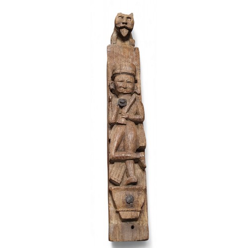 423 - An 18th century oak carved pillar/fragment, with naive huntsman, mystical beast terminal, 68.5cm hig... 