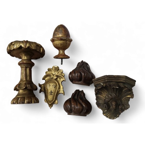 358 - A pair of 19th century mahogany flame finials, 7cm high;  a gilt anthemion, 10cm high;  etc (6)