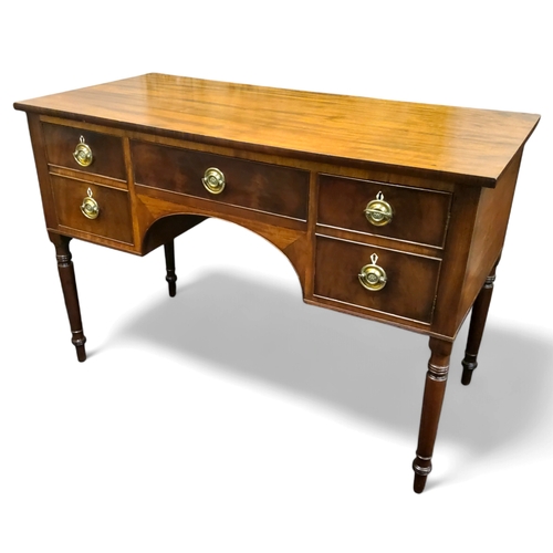 664 - A George III flamed mahogany dressing table, central cockbeaded drawer, two blind drawers to left, c... 