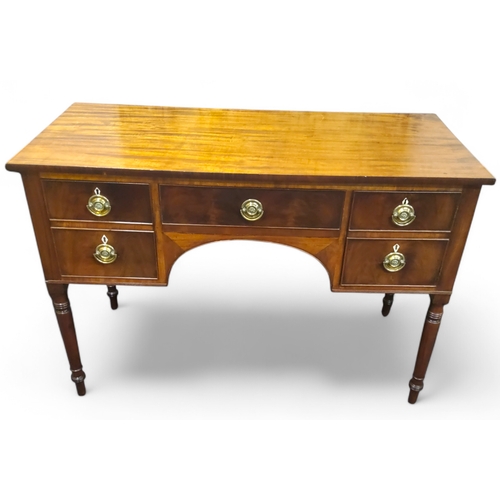 664 - A George III flamed mahogany dressing table, central cockbeaded drawer, two blind drawers to left, c... 