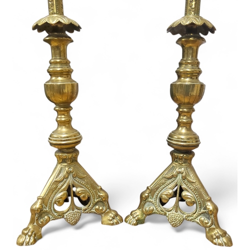 364 - A pair of late 19th / early 20th century century French brass ecclesiastical altar candlesticks, kno... 