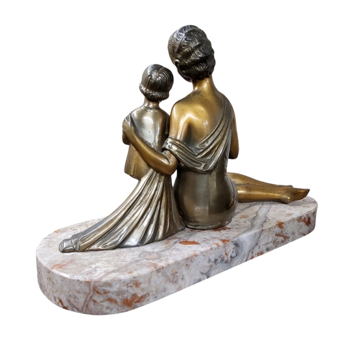 522 - French School, Art Deco,  after H Balleste, a parcel gilt bronze, of a seated lady holding a swallow... 