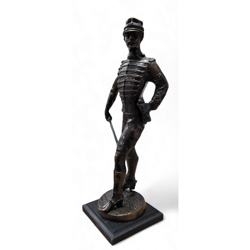 521 - French School, 20th century, a dark patinated bronze, iof a French Cavalry Officer, standing, 36.5cm... 