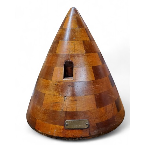 444 - An early 20th century aeroplane nose cone mould, made from individual shaped blocks, brass plaque DP... 