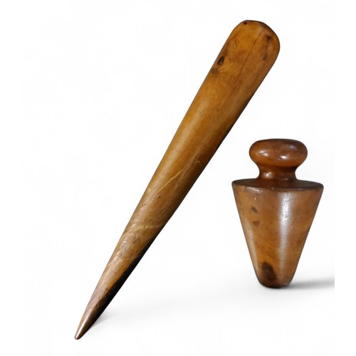 594 - Treen - a Victorian lignum vitae sailor's fid, 38cm long;  a Victorian darn, 15cm (2)